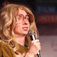 Lapkus, in a wig, at a live event (Photo: Getty Images)